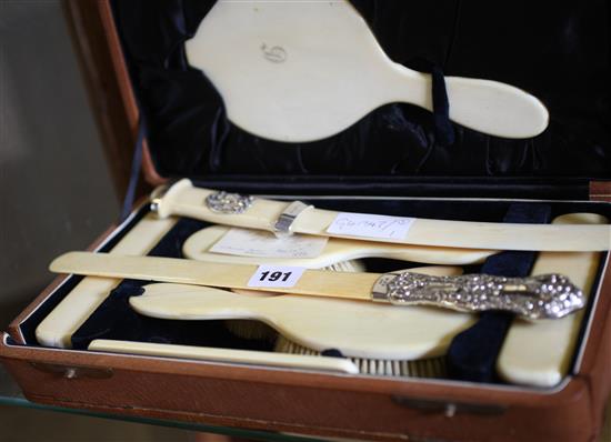 Silver mounted ivory paper openers/ turners & brush set